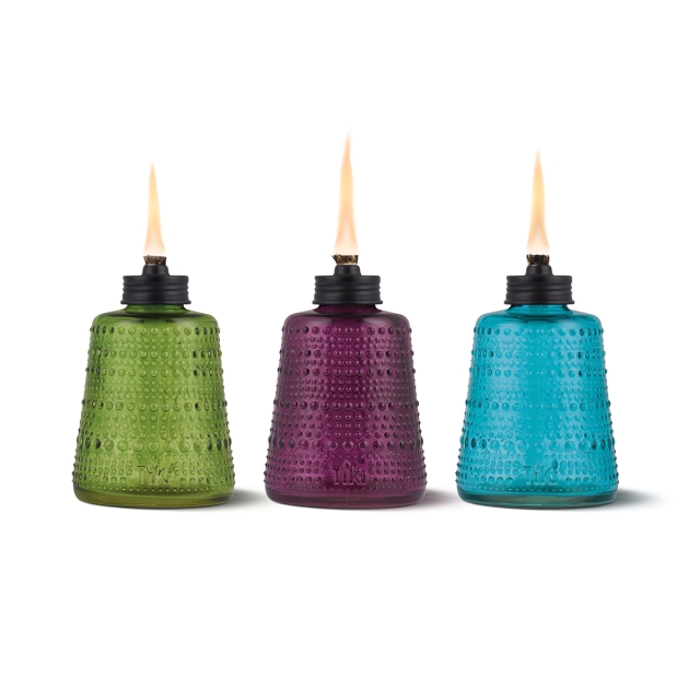 three table torches green blue and purple