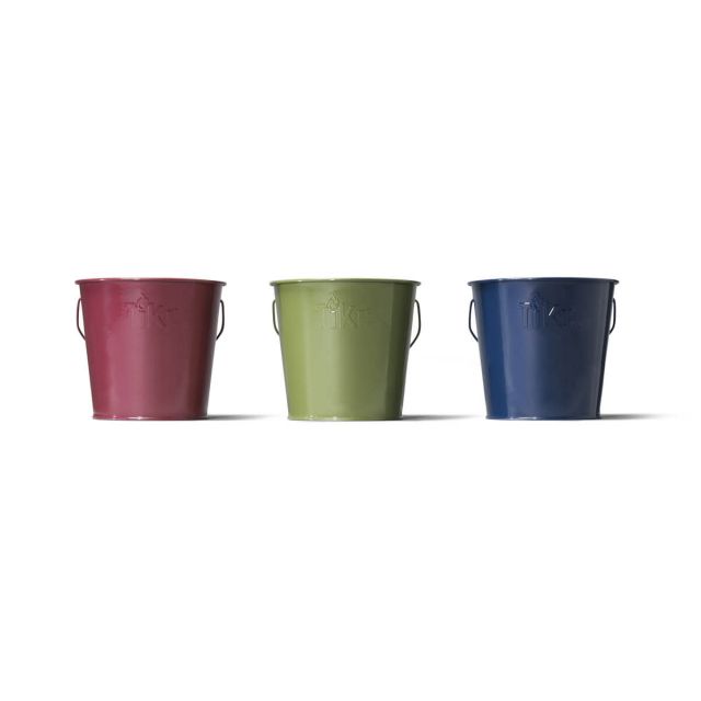 red green and blue 17 ounce tiki wax candles up close white background