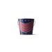 USA pattern tiki wax candle up close white background