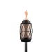 close up black metal tiki torch