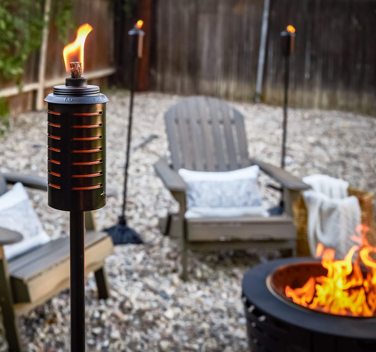 Horizon Metal Torches around a smokeless fire pit